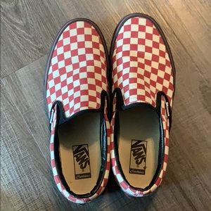 Custom red and black checkered slide on vans